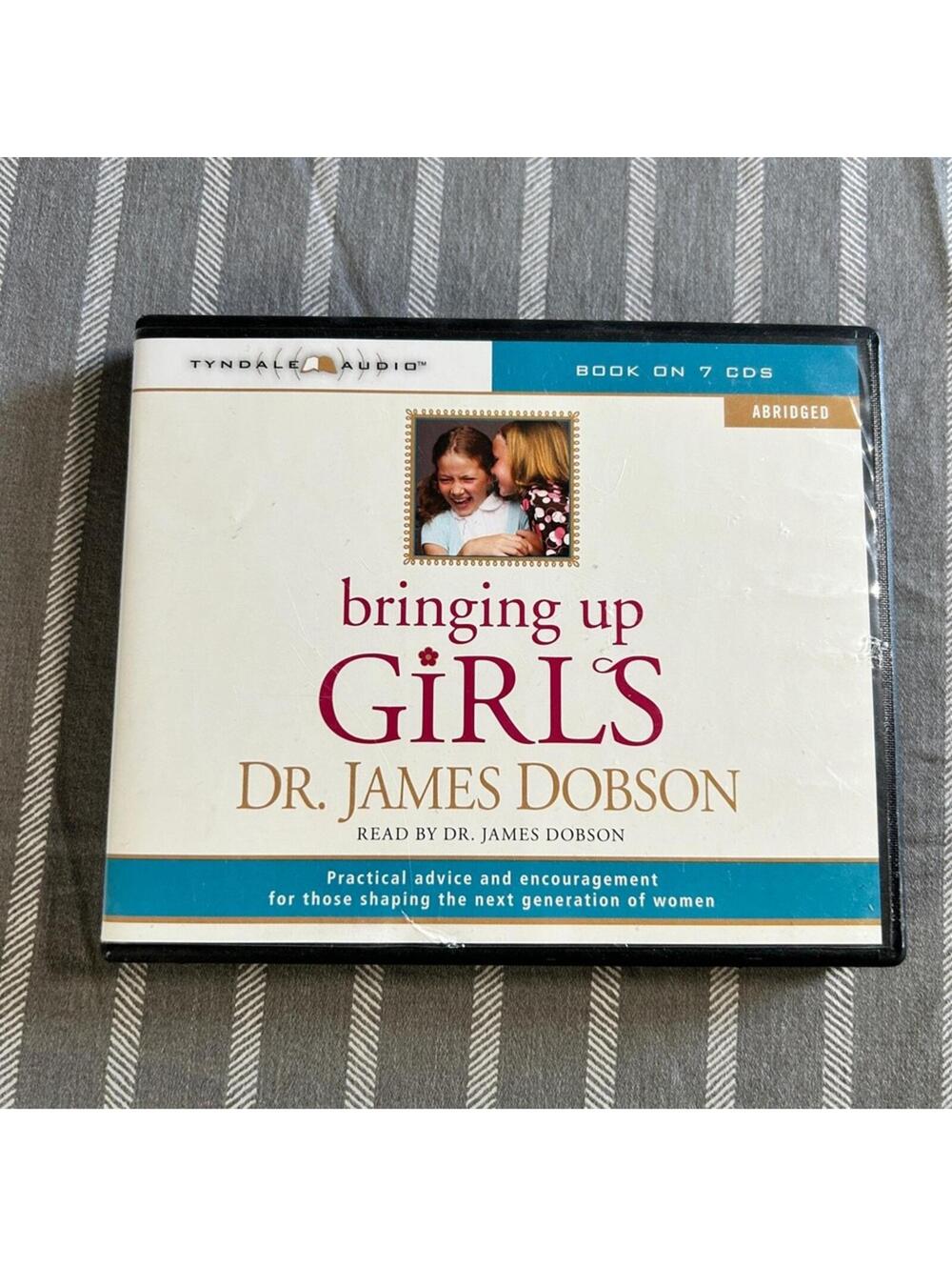 Bringing Up Girls audiobook by Dr. James Dobson. Includes 7 CDs.